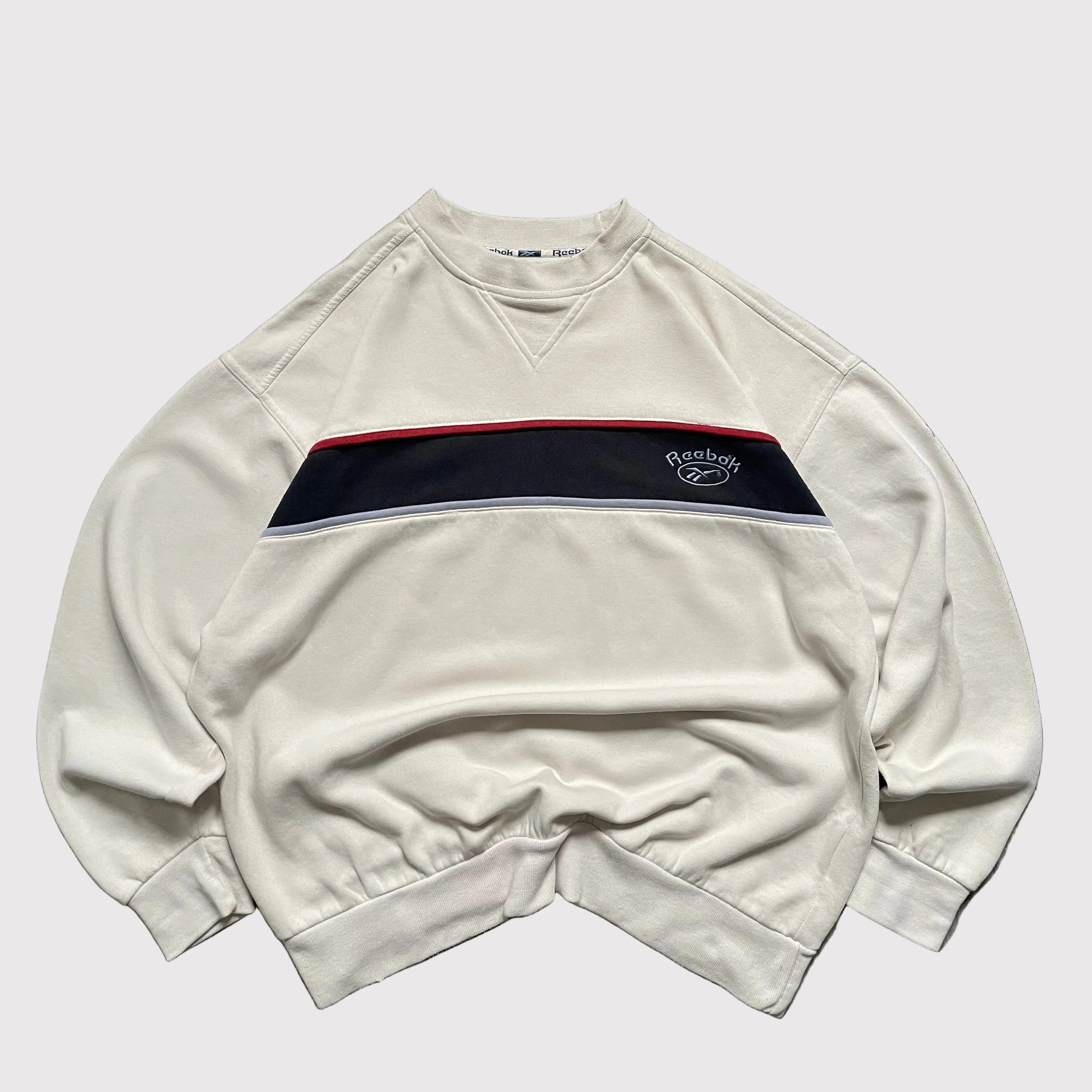 Vintage Reebok sweatshirt in cream, front panel design for a retro look